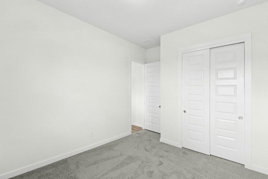 Spacious, unfurnished interior of a new home in The Colony, Bastrop (Image 22).