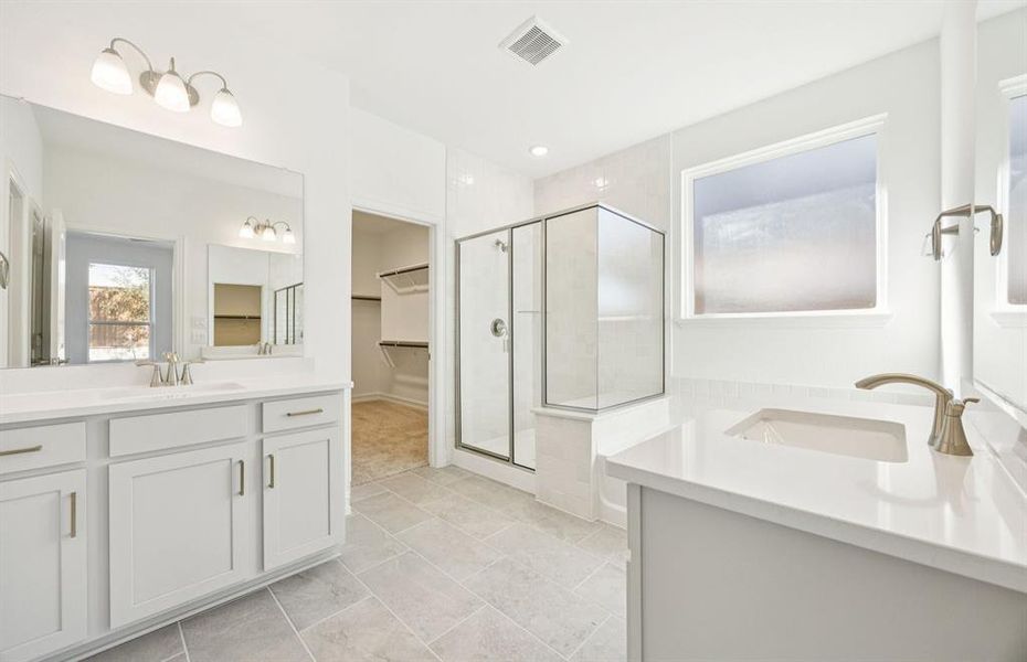 Shower and soaking tub in owner's bath