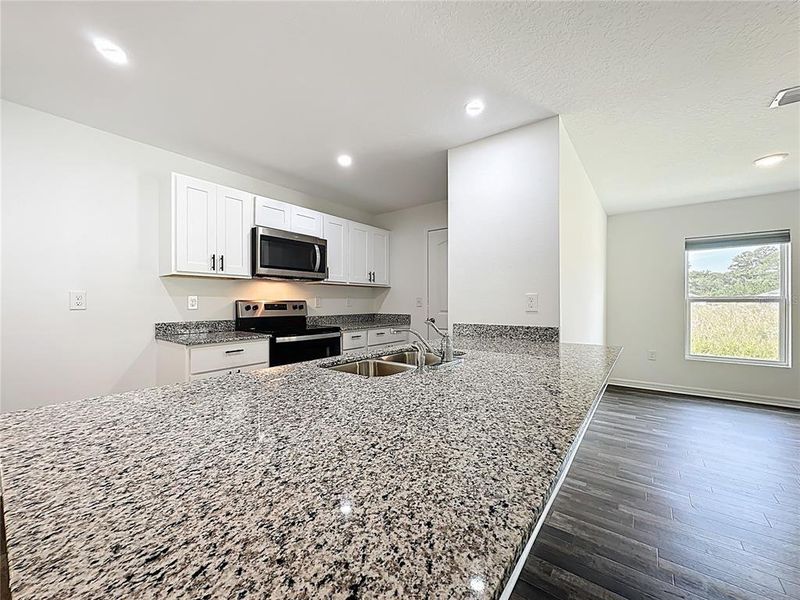 Furnished interior view inside a new home in , Crescent City (Image 3).