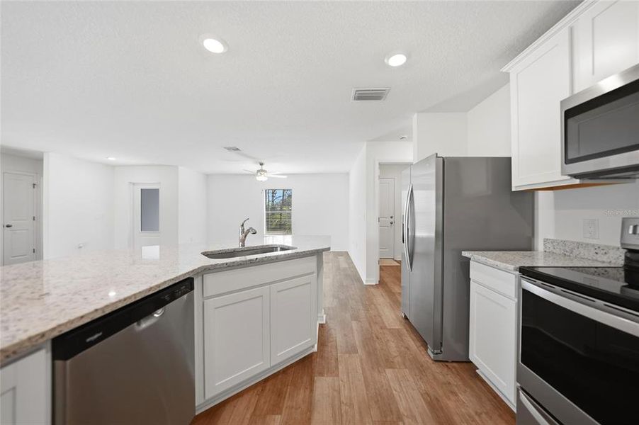 Furnished interior view inside a new home in , Port Charlotte (Image 10).