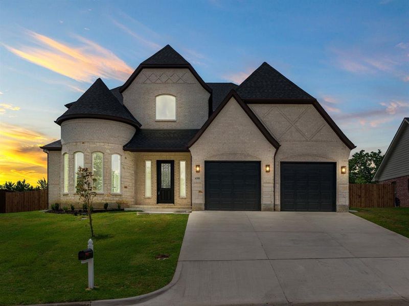 Front exterior of a new home in , Denison, TX, highlighting curb appeal (Image 20). Front exterior of a new home in , Denison, TX, highlighting curb appeal (Image 20).