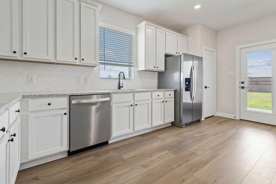 Furnished interior view inside a new home in Emberly, Beasley (Image 8).