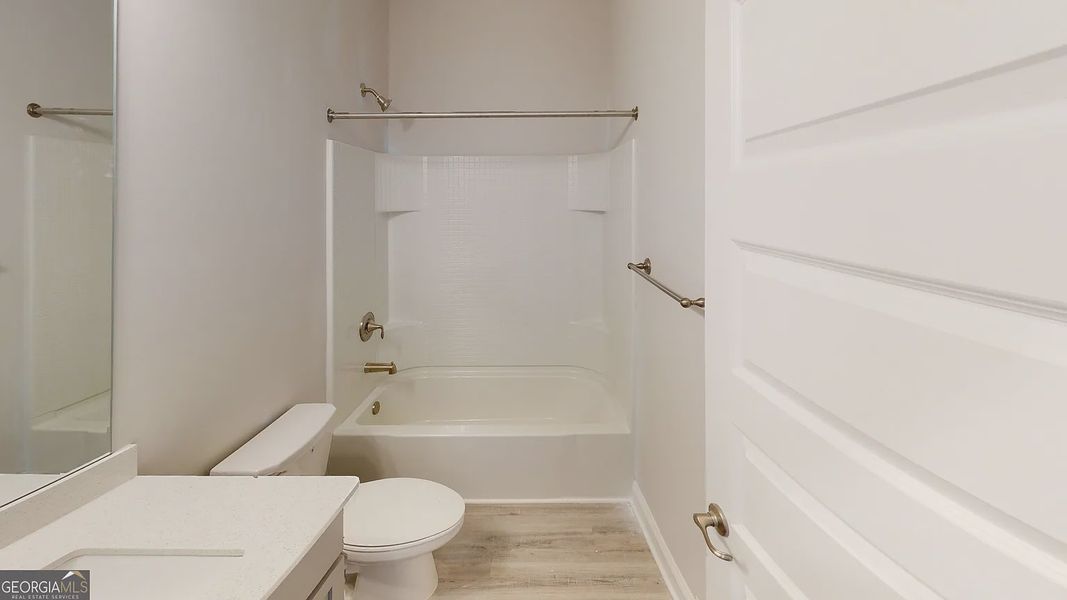 Furnished interior view inside a new home in Holliday Pass, Griffin (Image 6).