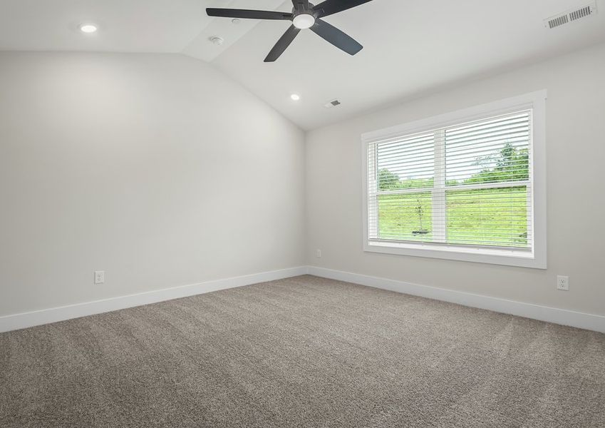 Rest and relaxation await in the master bedroom