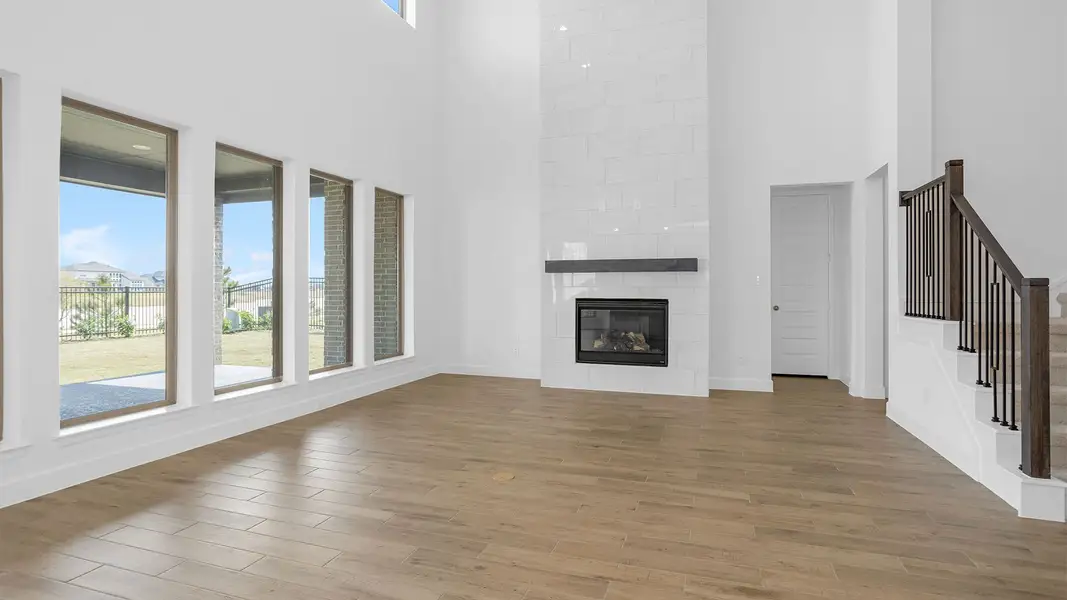 Representative unfurnished interior of a home built from the 3896W by Perry Homes in Terraces, Rockwall (Image 6).