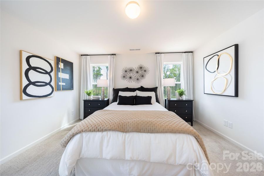 Furnished interior view inside a new home in Dukes Ridge, Charlotte (Image 10).