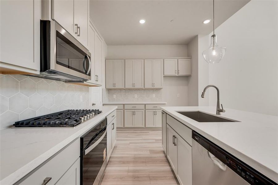 Furnished interior view inside a new home in Wade Settlement Townhomes, Frisco (Image 3). Furnished interior view inside a new home in Wade Settlement Townhomes, Frisco (Image 3).