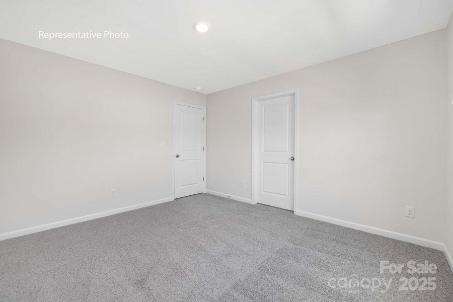 Spacious, unfurnished interior of a new home in Sanctuary at Southgate, Indian Trail (Image 30).