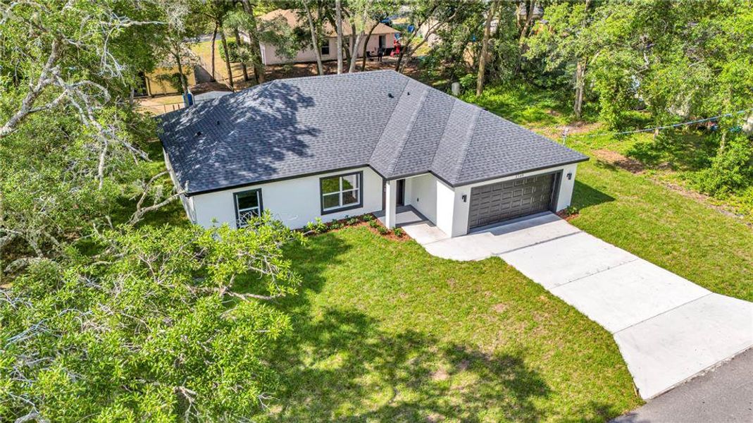 Front exterior of a new home in , Orange City, FL, highlighting curb appeal (Image 23).