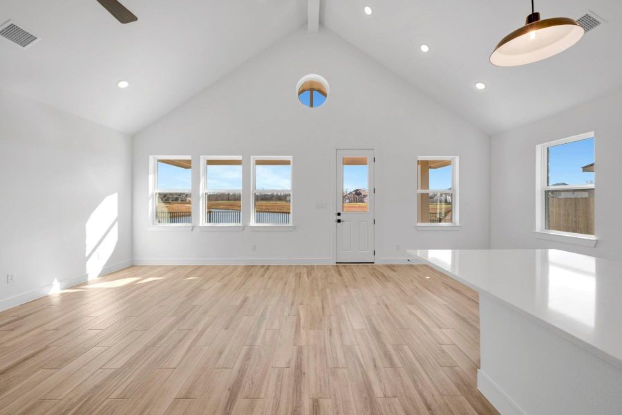 Open great room and dining area (*Photo not of actual home and used for illustration purposes only.)