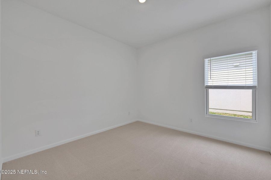 Spacious, unfurnished interior of a new home in Cordova Palms, St. Augustine (Image 32).