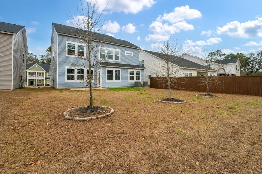 Exterior details and patio area of a home in Limehouse Village: Arbor Series, Summerville (Image 4). Exterior details and patio area of a home in Limehouse Village: Arbor Series, Summerville (Image 4).