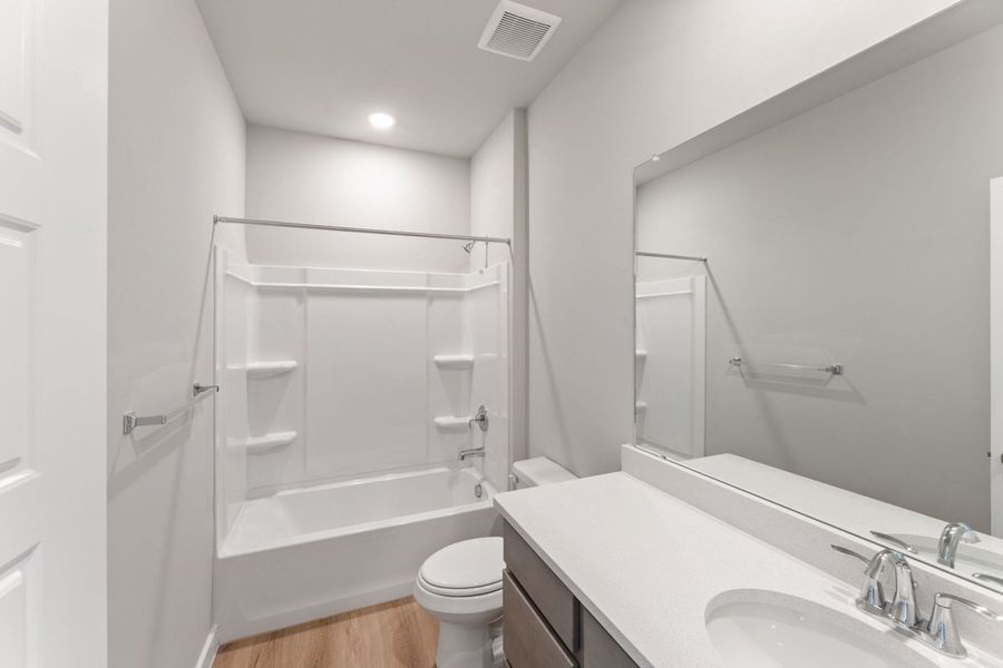 Furnished interior view inside a new home in Hunters Ranch, San Antonio (Image 7).