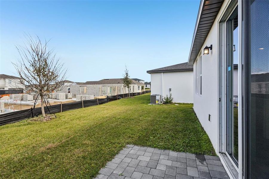 Exterior details and patio area of a home in Crosswinds - Classic Series, Haines City (Image 21).