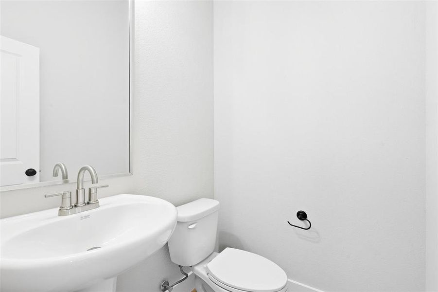 Bathroom with toilet and a sink