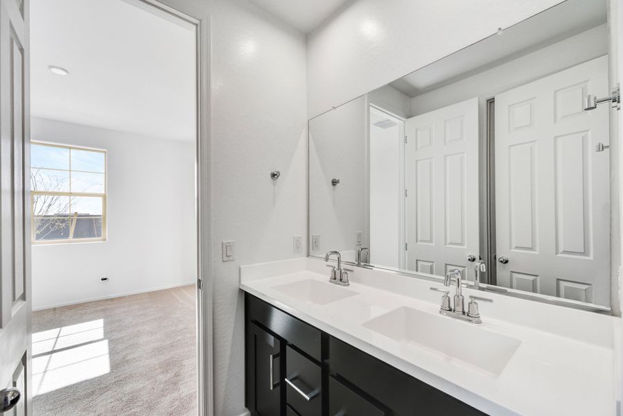 Furnished interior view inside a new home in Marbella at Windrose, Waddell (Image 13).