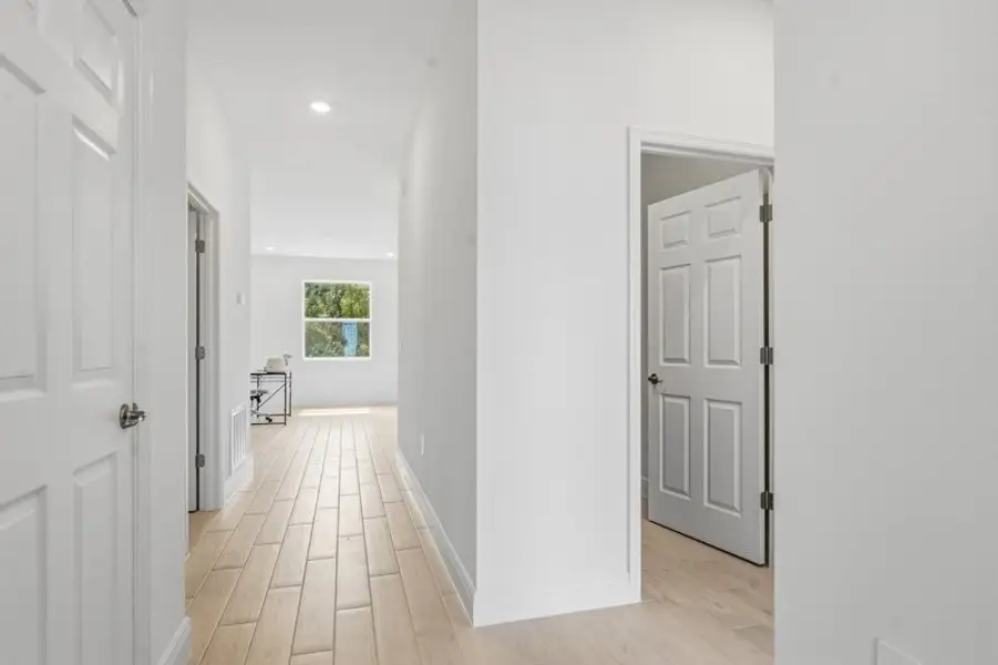 Spacious, unfurnished interior of a new home in Huntington Park, Titusville (Image 32). Spacious, unfurnished interior of a new home in Huntington Park, Titusville (Image 32).