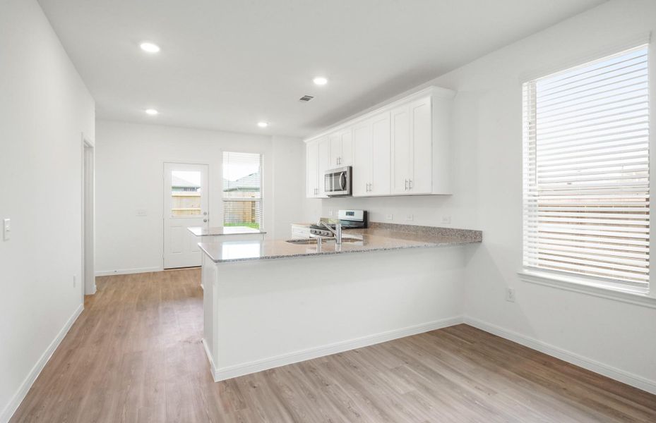 Furnished interior view inside a new home in Crosby Farms, Crosby (Image 4). Furnished interior view inside a new home in Crosby Farms, Crosby (Image 4).
