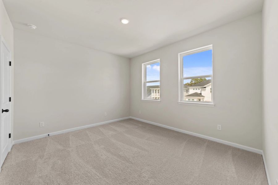 Spacious, unfurnished interior of a new home in Blue Heron Retreat, Little River (Image 22).