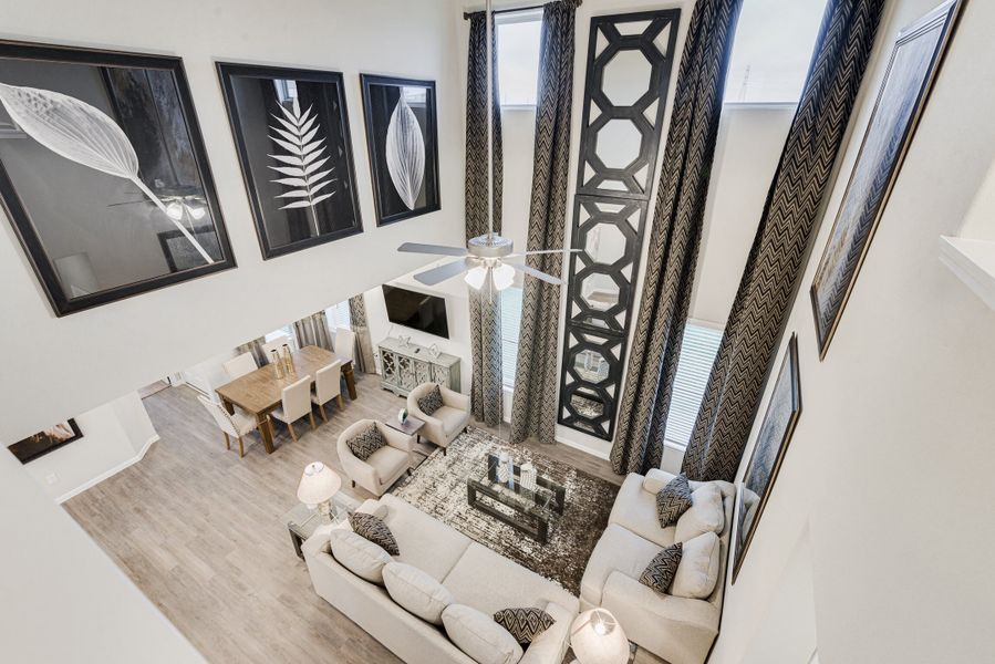 Representative furnished interior of a home built from the Floor Plan 2102 by Colina Homes in Sunterra, Katy (Image 11). Representative furnished interior of a home built from the Floor Plan 2102 by Colina Homes in Sunterra, Katy (Image 11).