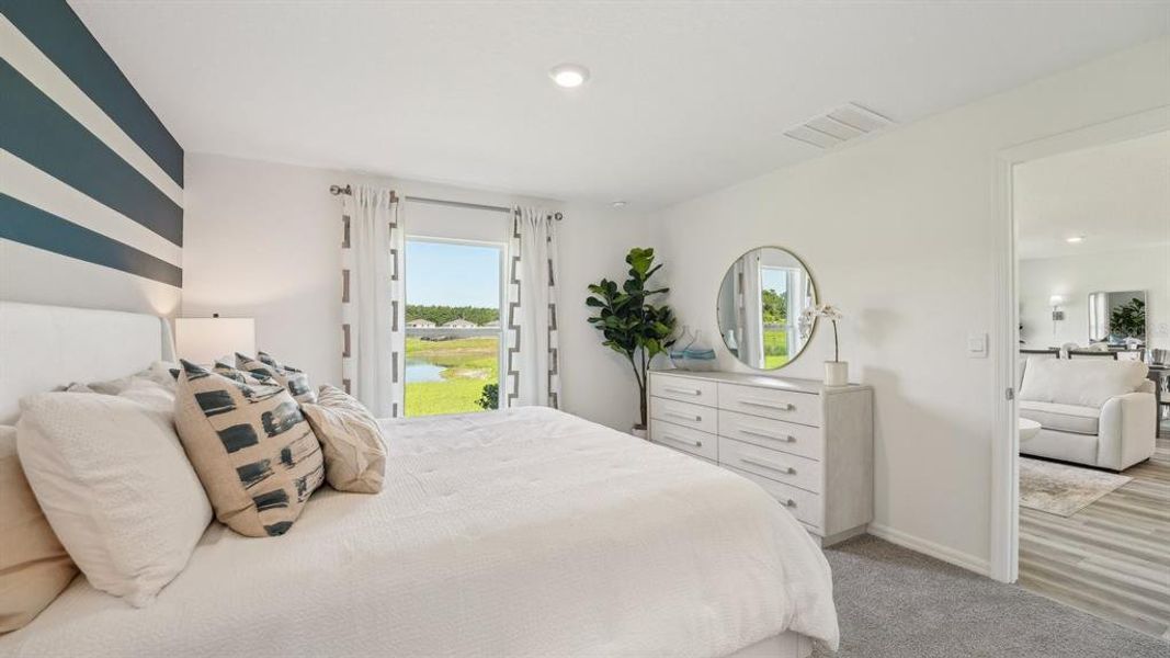 Furnished interior view inside a new home in Triumph South, Wildwood (Image 19).