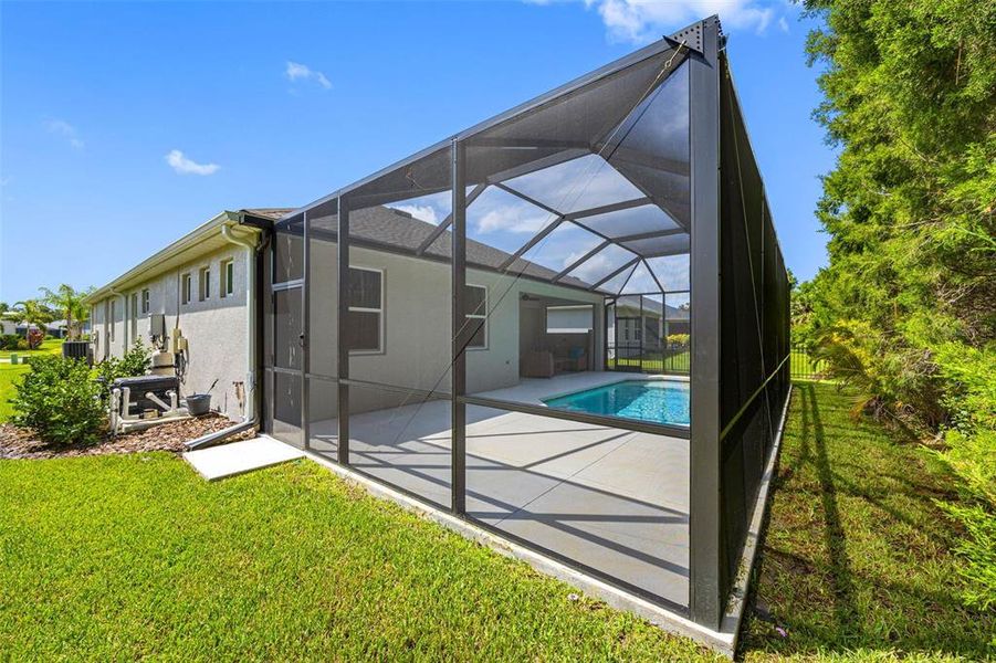 Exterior details and patio area of a home in , Parrish (Image 27).