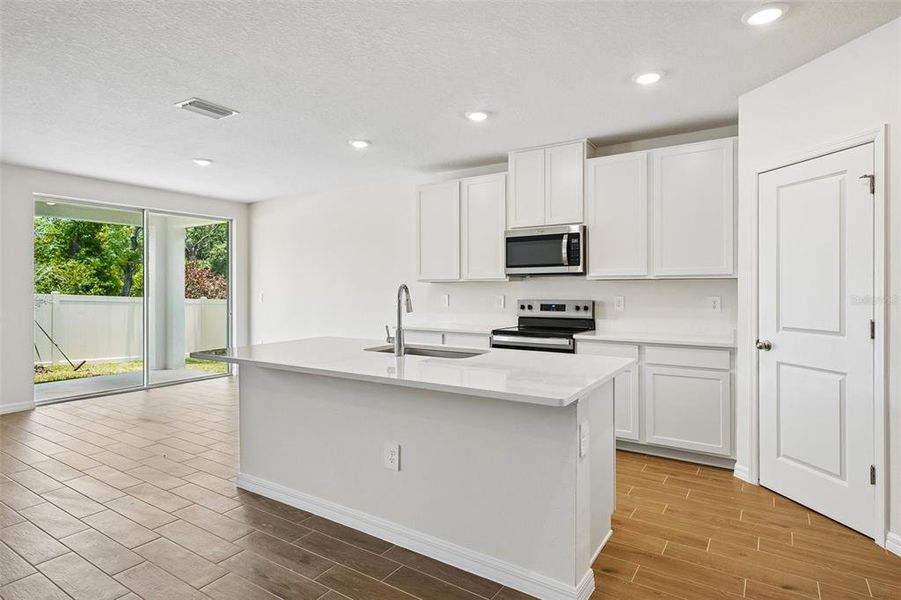 Furnished interior view inside a new home in Pine Ridge Meadows, Hudson (Image 6).