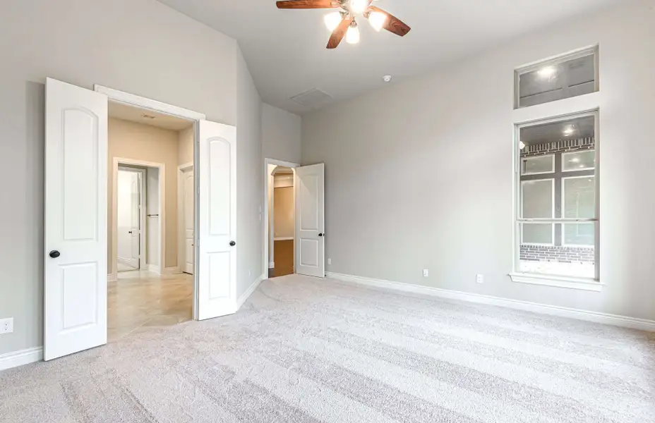 Representative unfurnished interior of a home built from the 3616 by Ravenna Homes in Artavia 70′, Conroe (Image 41).
