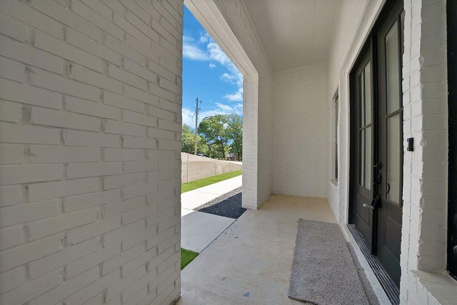 Exterior details and patio area of a home in , Joshua (Image 3).