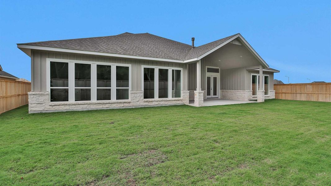 Front exterior of a new home in Fulshear Lakes 80', Fulshear, TX, highlighting curb appeal (Image 14).
