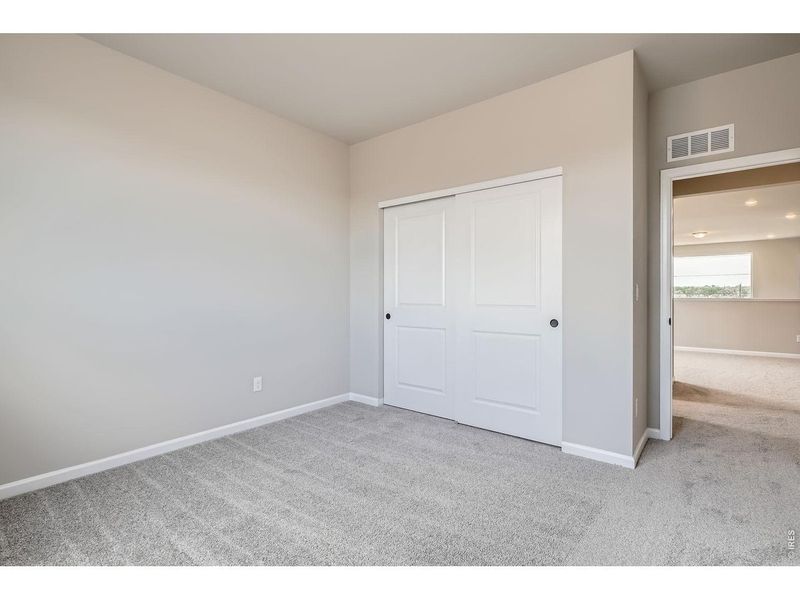 Spacious, unfurnished interior of a new home in Farmstead, Berthoud (Image 34).