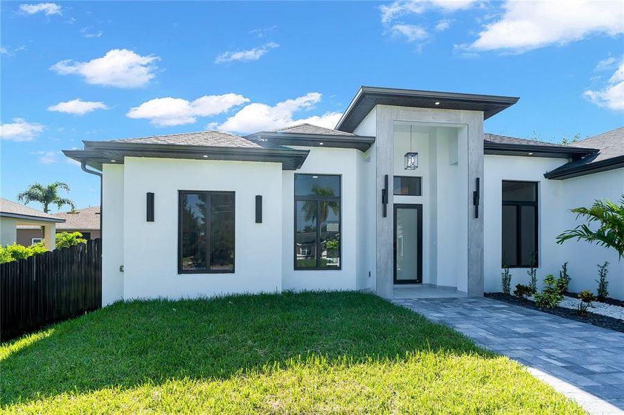 Exterior details and patio area of a home in , Cape Coral (Image 36).