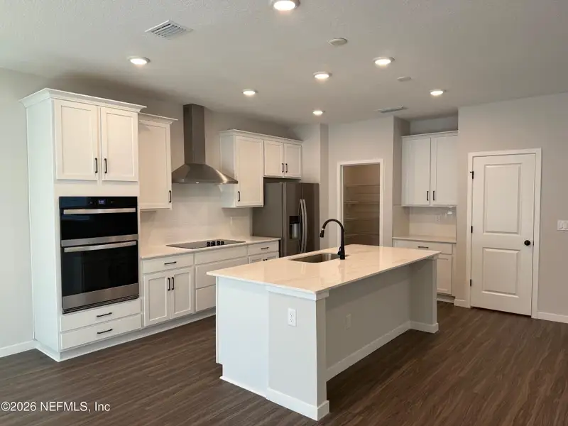 Furnished interior view inside a new home in The Preserve at Concourse Crossing, Fernandina Beach (Image 5).