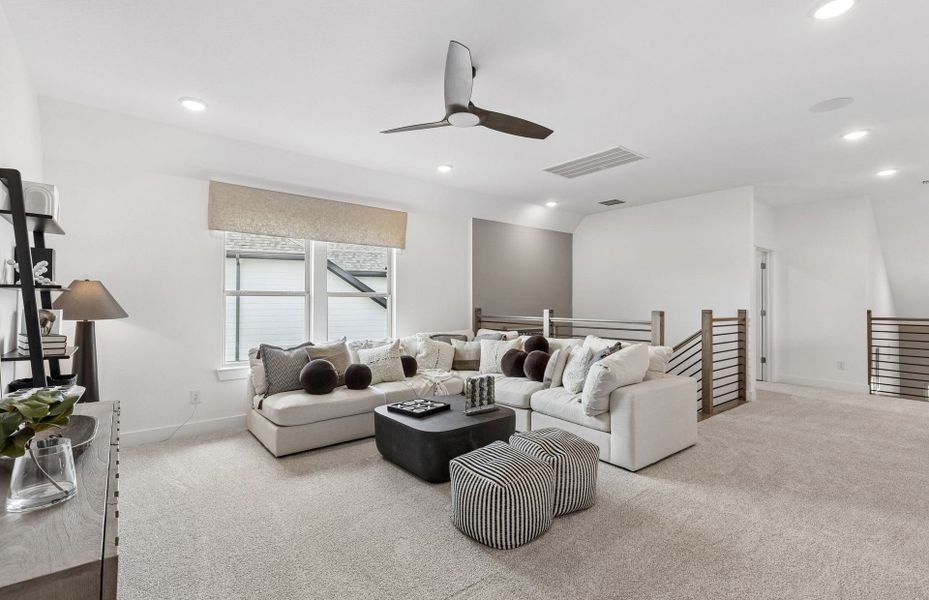 Representative furnished interior of a home built from the Iredell by Pulte Homes in Katy Court, Katy (Image 46).