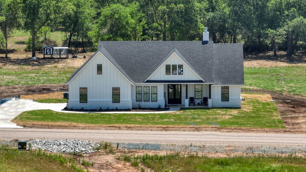 Representative exterior photo of a completed home built from the Lakeshore by Zeal Home Builders in Horizon Meadow Estates, Paradise, TX (Image 31). Representative exterior photo of a completed home built from the Lakeshore by Zeal Home Builders in Horizon Meadow Estates, Paradise, TX (Image 31).