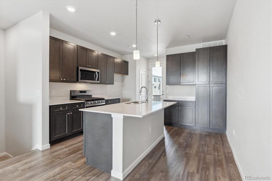 Furnished interior view inside a new home in Townhome Collection at Grand Vue at Interlocken, Broomfield (Image 3).