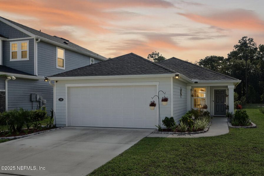 Front exterior of a new home in Brookside Preserve, St. Johns, FL, highlighting curb appeal (Image 18).