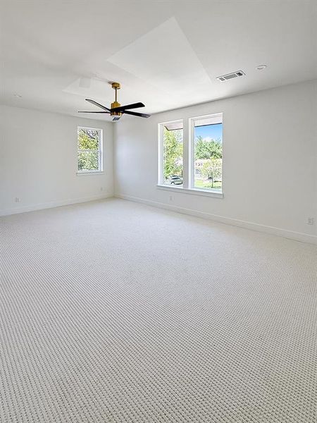 Unfurnished room with baseboards and a ceiling fan Unfurnished room with baseboards and a ceiling fan
