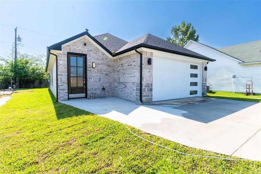 Front exterior of a new home in , Gun Barrel City, TX, highlighting curb appeal (Image 2). Front exterior of a new home in , Gun Barrel City, TX, highlighting curb appeal (Image 2).