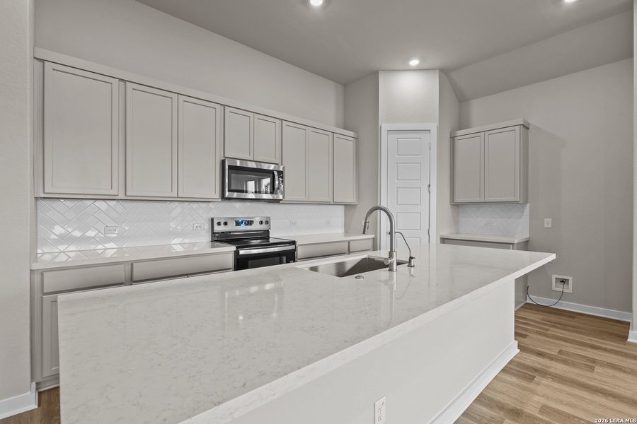 Furnished interior view inside a new home in Megan's Landing, Castroville (Image 12).