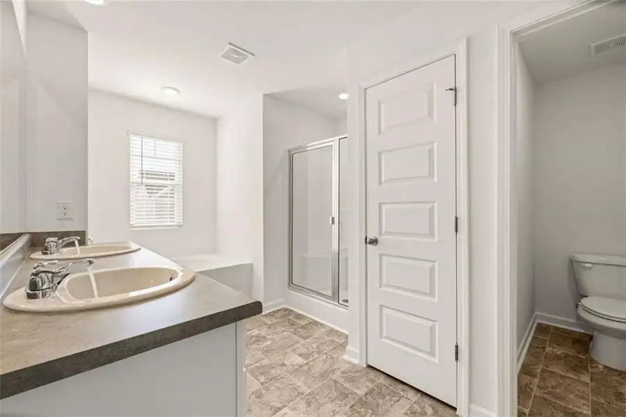 Furnished interior view inside a new home in Oakchase at Hampton, Hampton (Image 5).