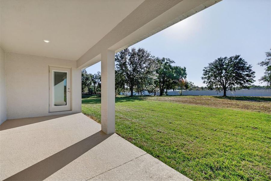 Exterior details and patio area of a home in Hill Country Estates, Dade City (Image 35).