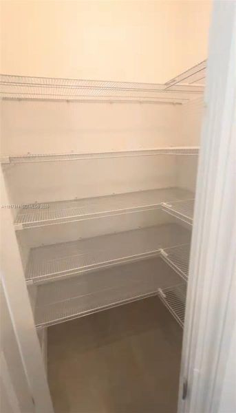 Spacious, unfurnished interior of a new home in The Townhomes at Bellalago, Kissimmee (Image 18).