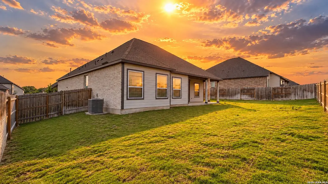 Exterior details and patio area of a home in Potranco West, Castroville (Image 4).