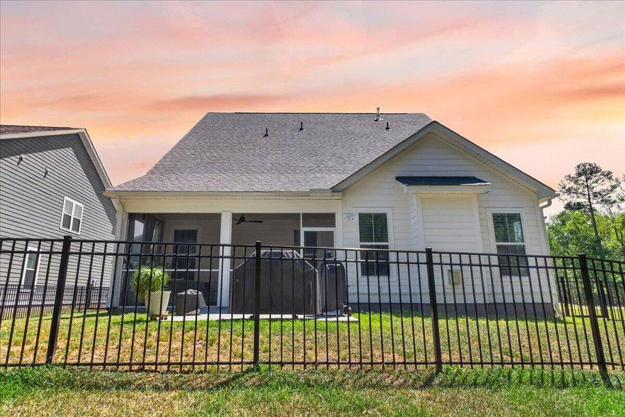Exterior details and patio area of a home in Tidewater at Lakes of Cane Bay, Summerville (Image 24).