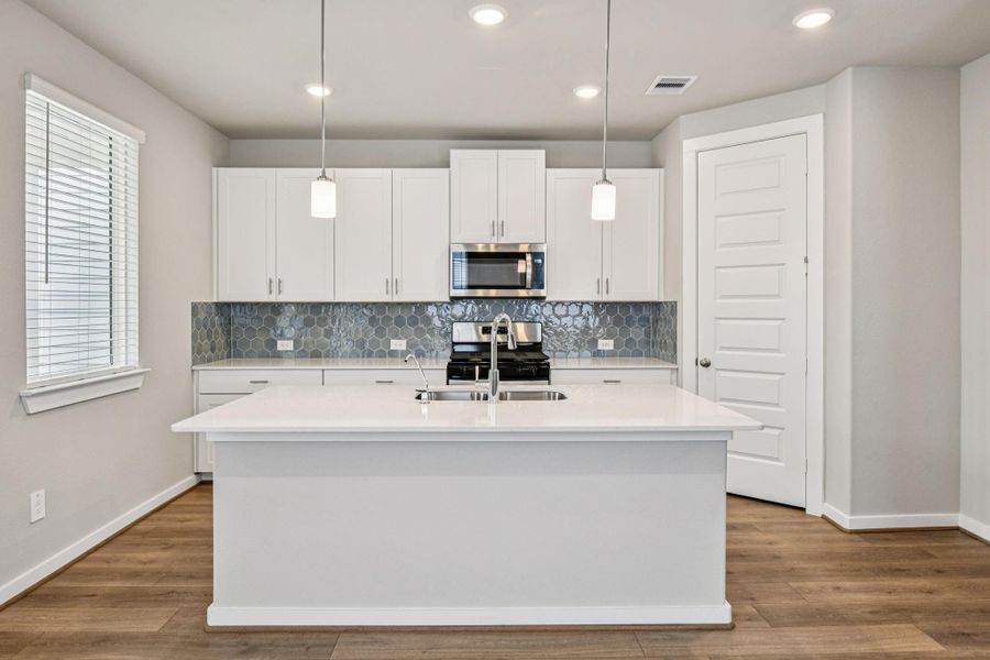 Photo is not of the actual home, but is an inspirational photo of builder’s model home and may depict options, furnishings, and/or decorator features that are not included