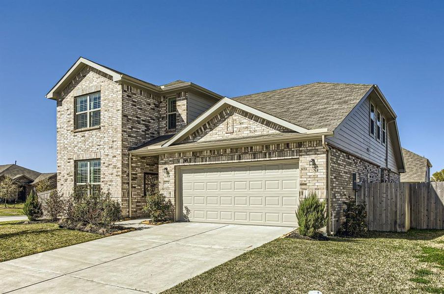 Built in 2023, this 4 bedroom, 3 bathroom home sits on a corner lot in the Seabourne Landing community of Richmond, Texas.