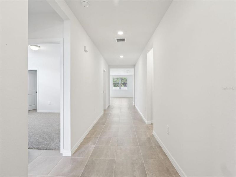 Spacious, unfurnished interior of a new home in The Reserve at Van Oaks, Auburndale (Image 29).