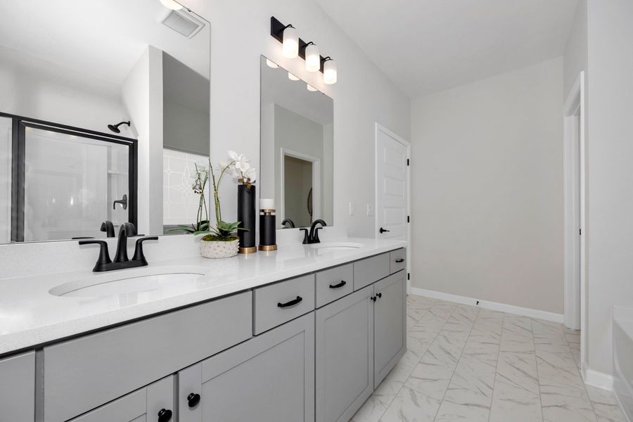 Representative furnished interior of a home built from the The Hampton by Smith Douglas Homes in La Segarra, Brookshire (Image 16).