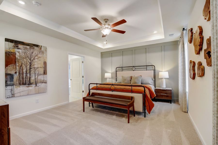 The Palmer- First Floor Primary Suite. The sample image is a staged model, to be used for illustrative purposes only. Upgrades, options, and colors will vary.